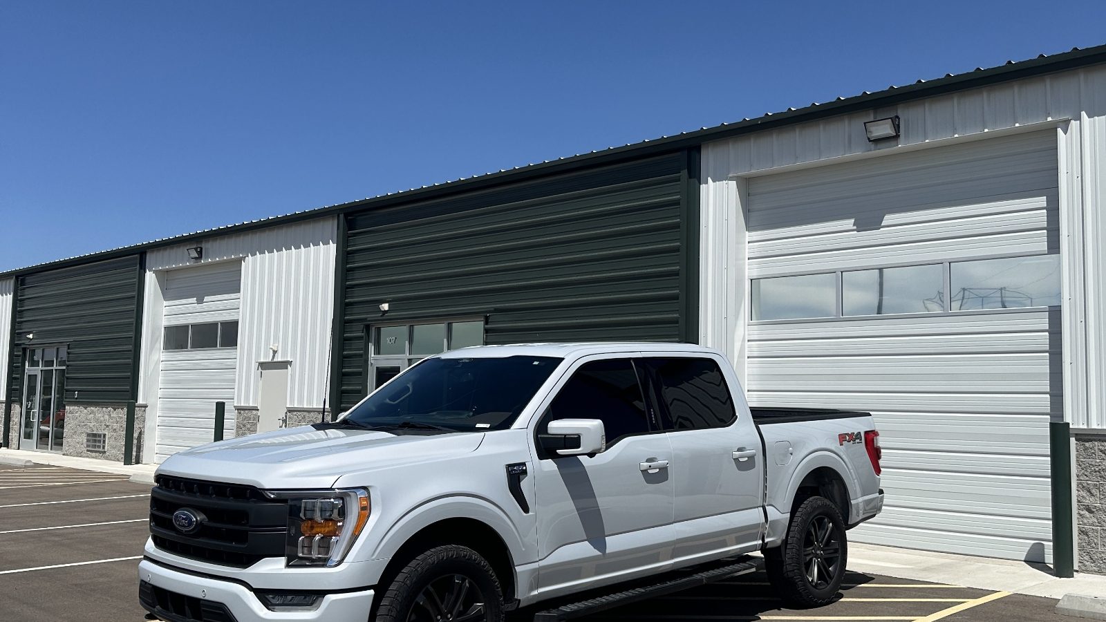 Ford F-150 with ceramic window tint installed at the 808 Customs shop in Caldwell, Idaho