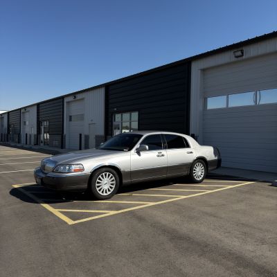 2003 Lincoln Town Car with carbon tint, after photo 2