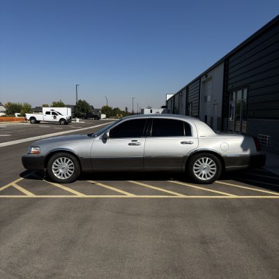 2003 Lincoln Town Car with carbon tint, after photo 3