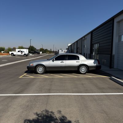 2003 Lincoln Town Car with carbon tint, after photo 5