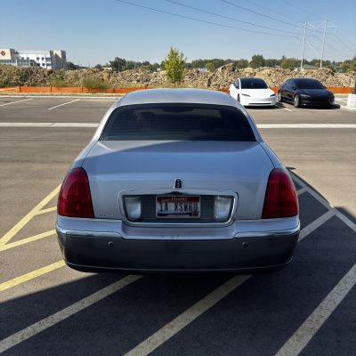 2003 Lincoln Town Car with carbon tint, after photo 4