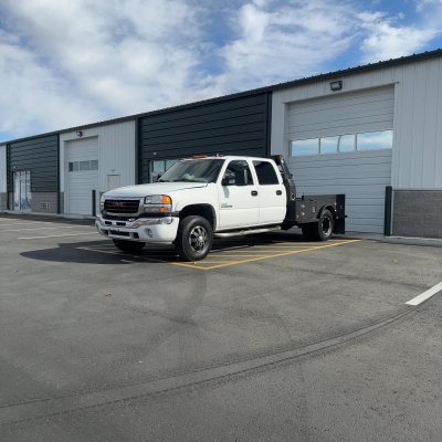 2006 GMC Sierra with carbon tint, after photo 1