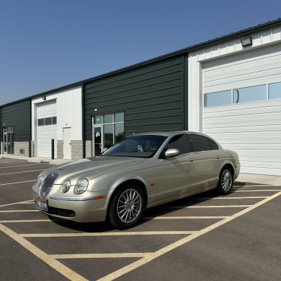 2007 Jaguar S-Type with carbon tint, after photo 1
